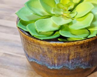 A perfect planter for your succulents or pothos; made from mid fire white clay and finished with brown and blue glazes cascading beautifully down the sides, its the perfect addition to compliment your plant collection.