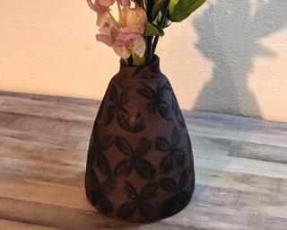 Adorn your home with this one of a kind dark purple stamped flower vase.