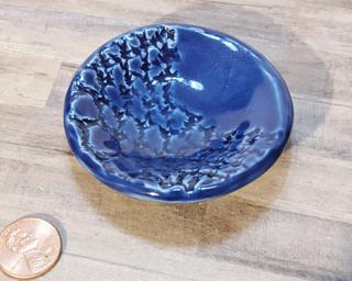 A sweet little blue dish for your dresser.