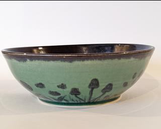 A sweet little bowl for your table. Small glaze crawl on inside rim