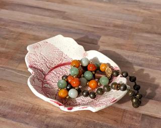 A sweet little jewelry dish for your dresser.
