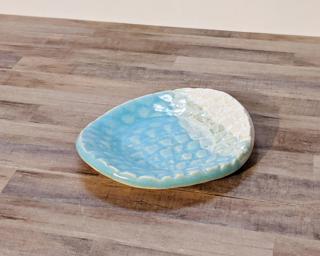 A sweet little wavy dish for your dresser.