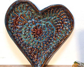 A sweet little textured heart dish for your dresser.