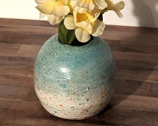 Accessorize your room with this lovely robin's egg blue bud vase.