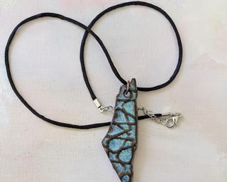 Show your support for Palestine with this handmade necklace.